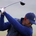 Tiger Woods takes a swing during a range session at the Open Championship on Wednesday.
