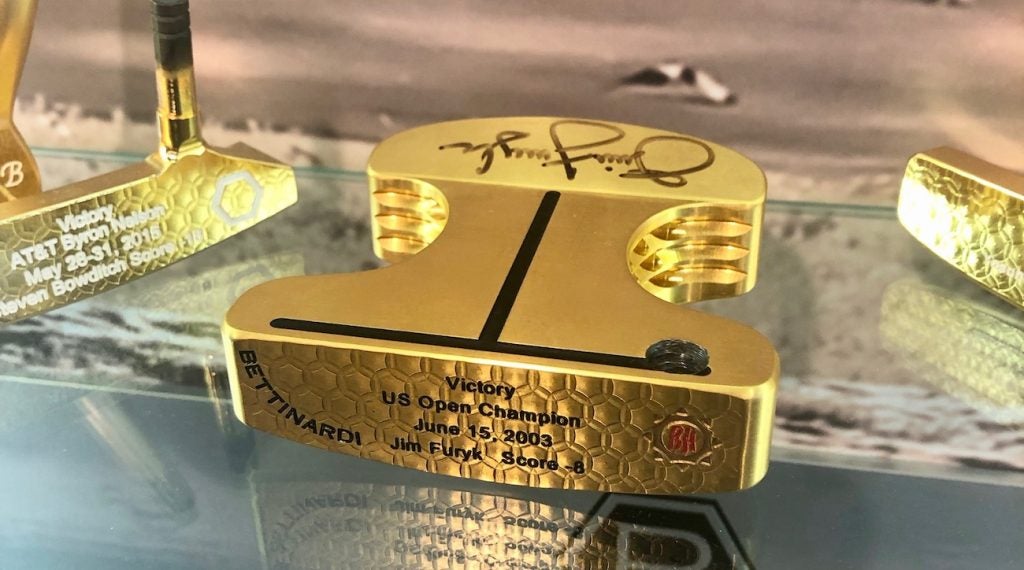 A gold version of Furyk's Bettinardi Baby Ben putter can be found in a display case at the company's headquarters. 