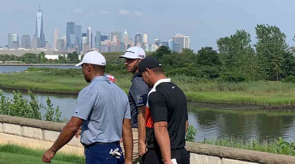 Tiger Woods, Brooks Koepka and Dustin Johnson with a New York backdrop.