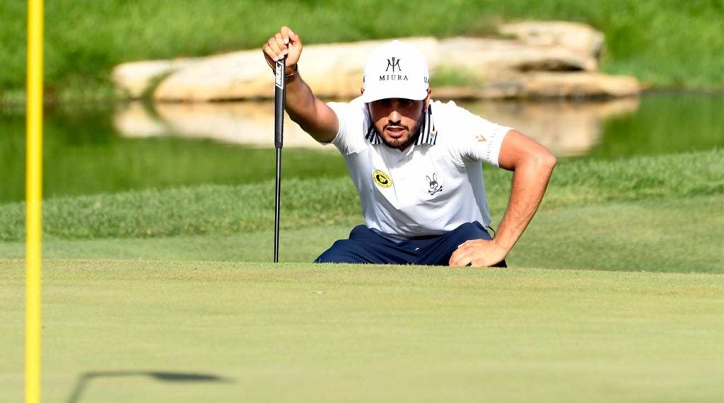 Abraham Ancer lines up a putt during the third round of The Northern Trust.