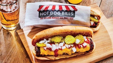 An ice-cold lager is the perfect pairing with Hot Dog Bills' iconic mashup.