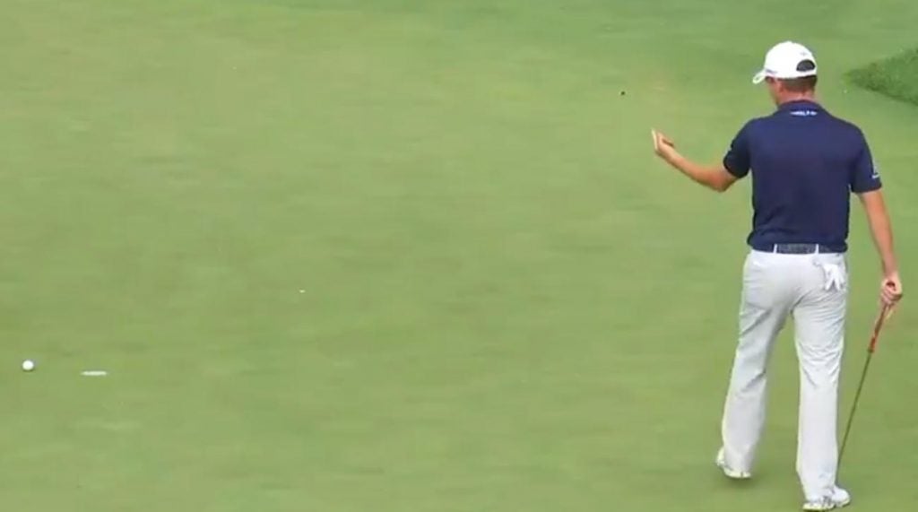 Emiliano Grillo flips off cup at Northern Trust