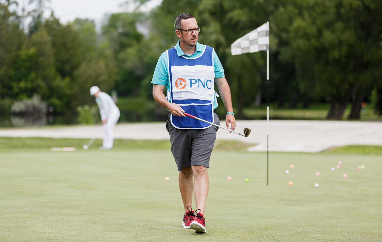 French walks off the practice green last weekend in Milwaukee. He's come to know hundreds of pros from his days caddying on development tours.