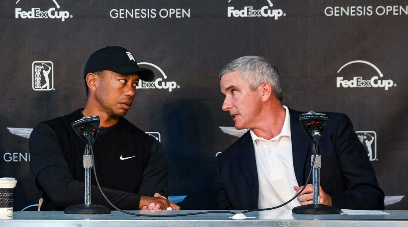 Tiger Woods with PGA Tour commissioner Jay Monahan in February.