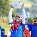 Suzann Pettersen hoists the Solheim Cup trophy after Europe beat the U.S. at Gleneagles.