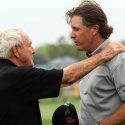 Arnold Palmer talks with Phil Mickelson during the 2010 Arnold Palmer Invitational at the Bay Hill.