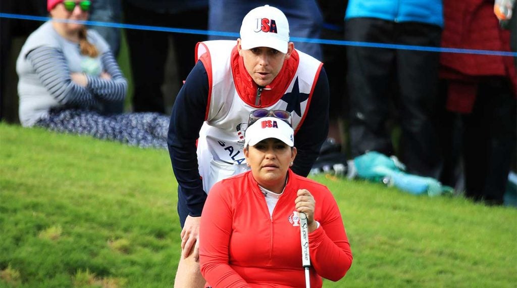 Lizette Salas lines up a putt during the first day of the Solheim Cup.