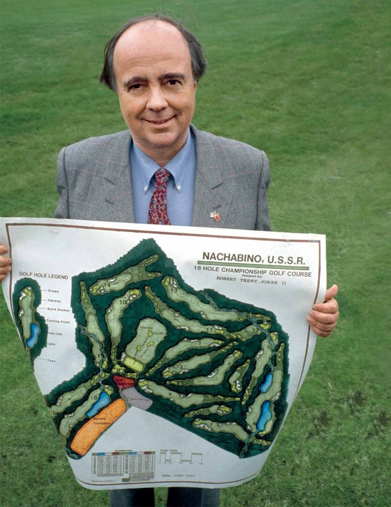 Jones holds a routing for the course, which now has more than 400 members.
