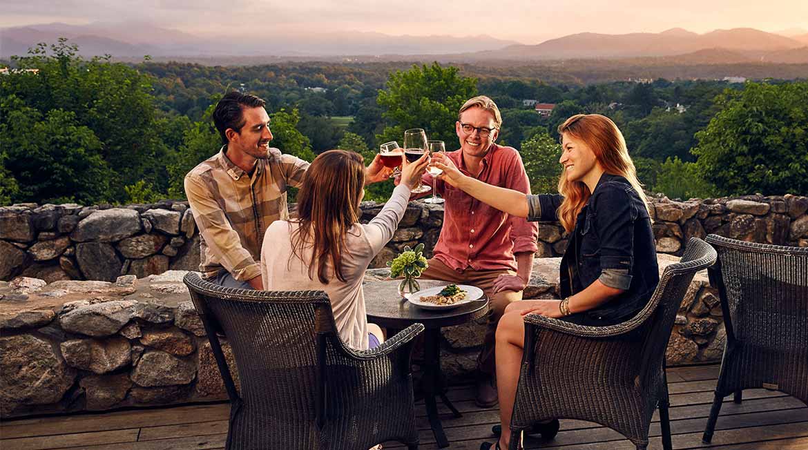 Guests enjoy an evening drink at Omni Grove Park Inn.