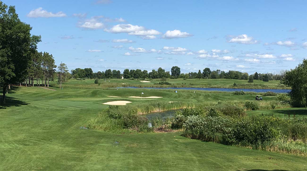 A view of the green (and the trouble to the right) of the par-3 7th hole.