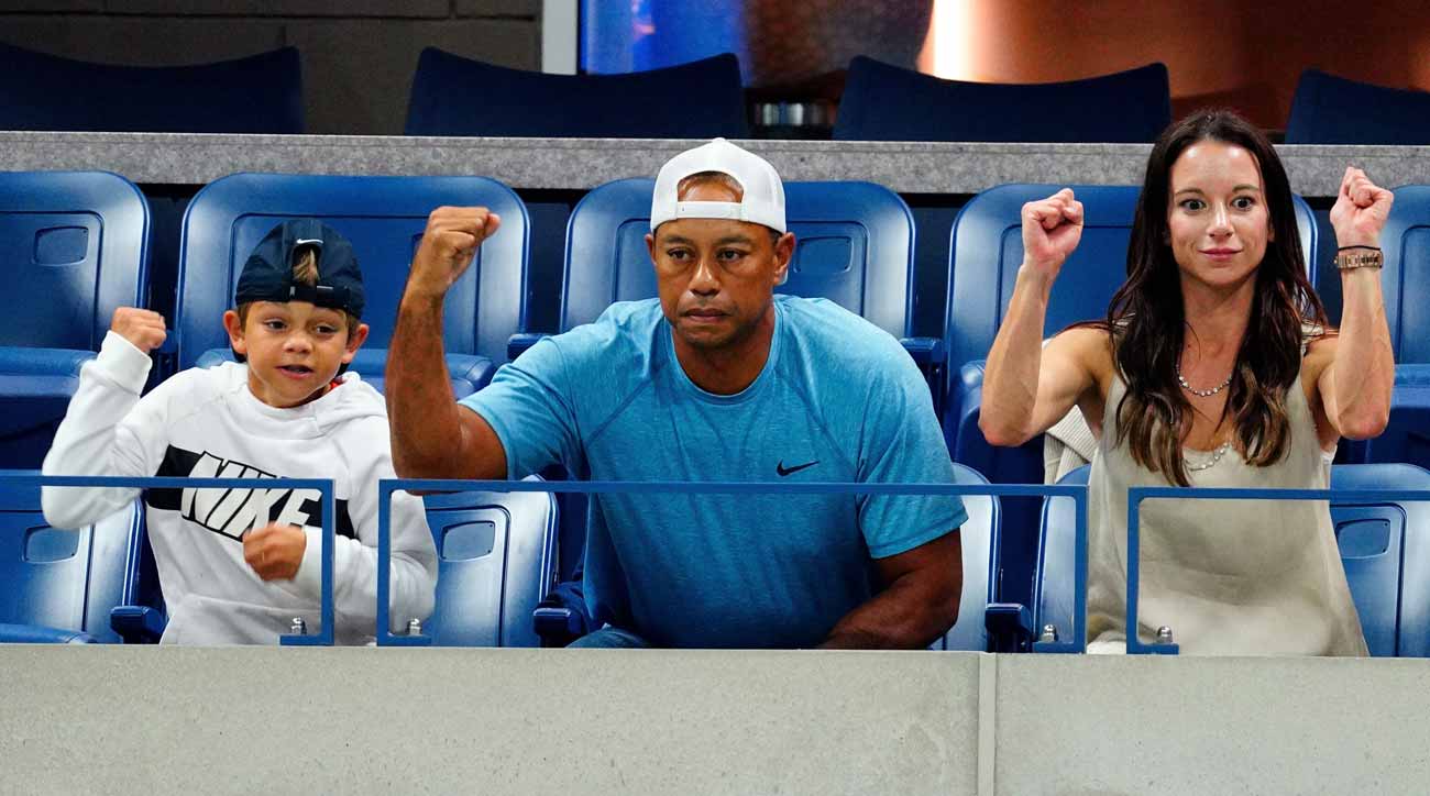 More fist-pumps from the Woods contingent.