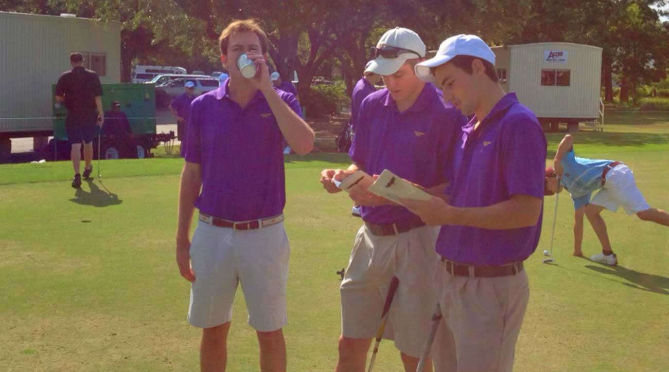 Dethier (far right) studying yardage books with teammates Jake Abrahams and Jack Ervasti. This would prove unhelpful.