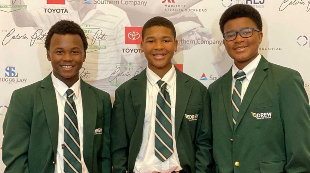 Three members of the Georgia state champion Drew Charter high school golf team.