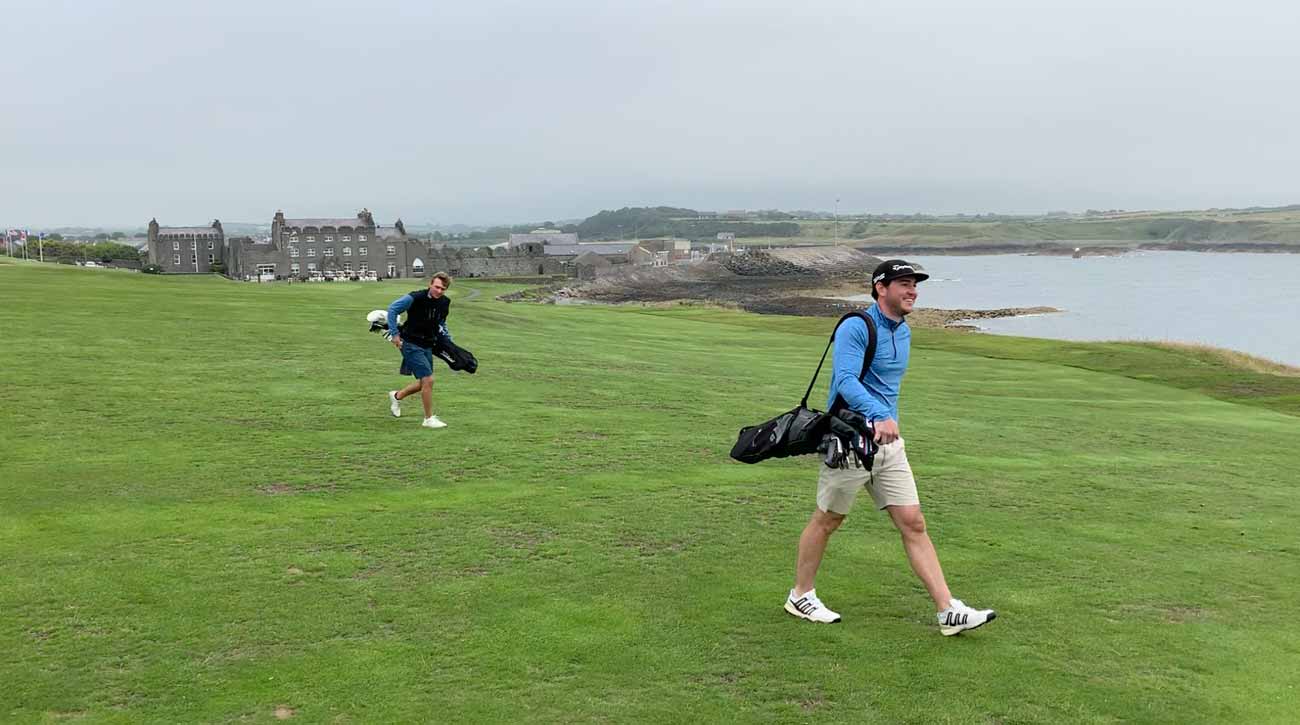 Matt and Taylor, with Ardglass' 600-year-old clubhouse/castle in the background.