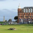 A golfer tees off at the Old Course at St. Andrews.
