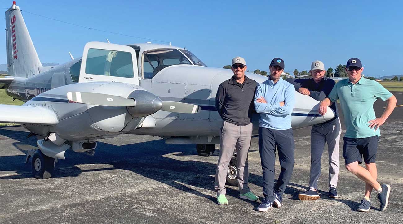 The foursome gets ready for a flight to their next adventure. We never said navigating all of these courses was easy.