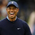 Tiger Woods laughs at a recent tournament.