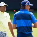 Tiger Woods and Rickie Fowler pictured at the 2019 Open Championship at Royal Portrush