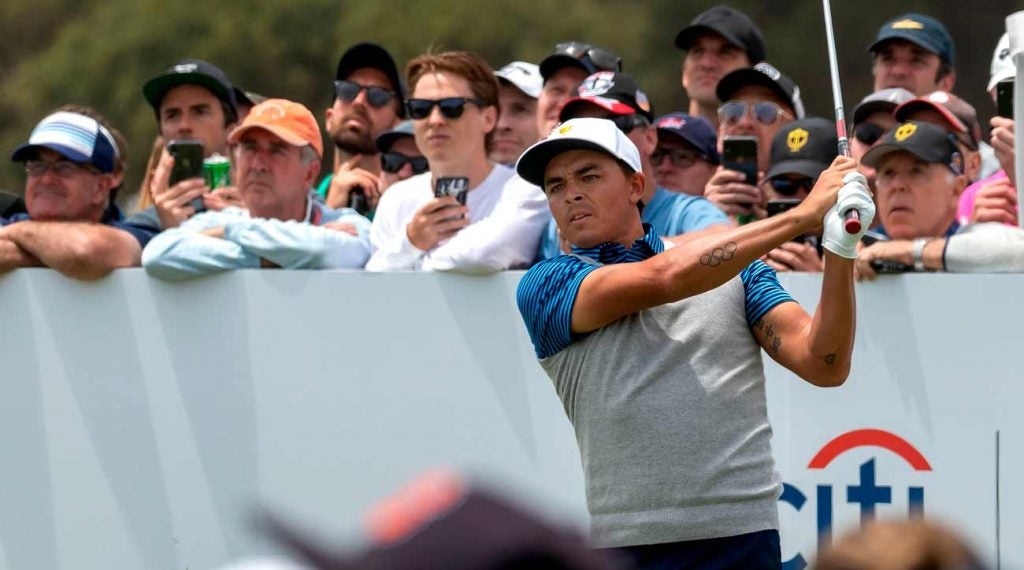 Rickie Fowler hits a tee shot during the second day of play at the 2019 Presidents Cup.