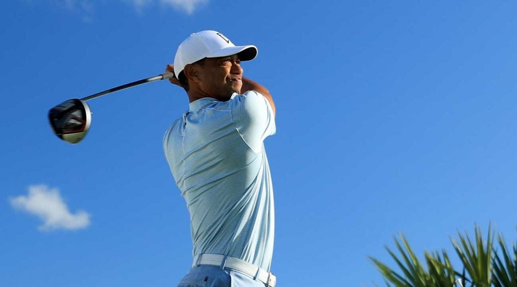 Tiger Woods tees off during a practice round at the 2019 Hero World Challenge.