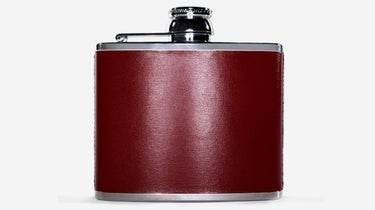 Still life of flask on white background