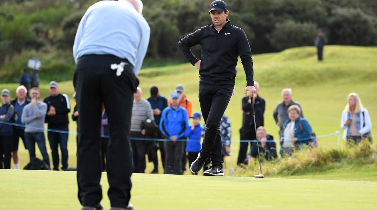 Rory McIlroy watching putting