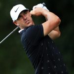 Brooks Koepka finishes his swing at the Tour Championship.