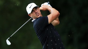 Brooks Koepka finishes his swing at the Tour Championship.