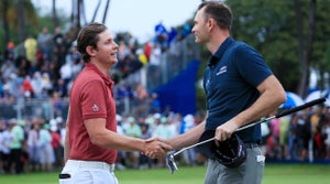 Cameron Smith shakes hands with Brendan Steele after winning the Sony Open on Sunday.