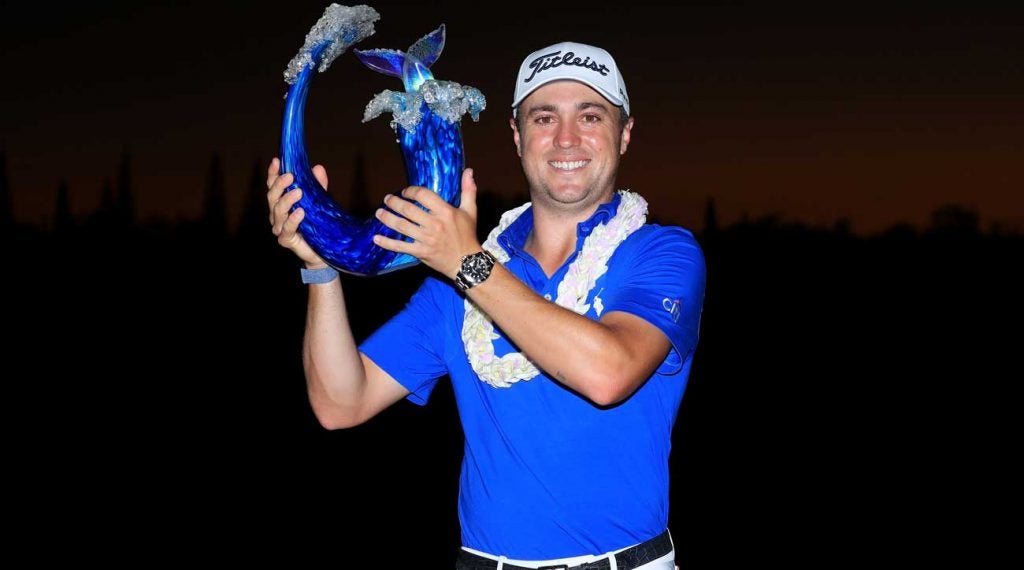 Justin Thomas poses for photos after winning the 2020 Tournament of Champions.