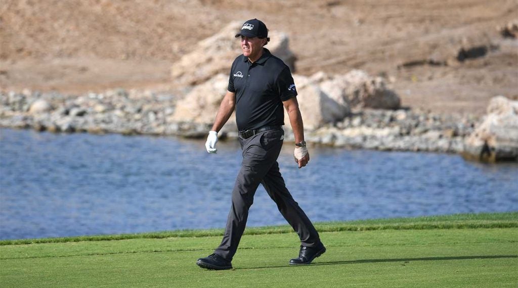 Phil Mickelson walks down the fairway during the opening round of the Saudi International on Thursday.