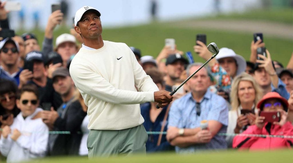 Tiger Woods chips onto the green during the second round of the Farmers Insurance Open on Friday at Torrey Pines.