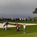 Tiger Woods plays the fifth hole on Torrey Pines' South Course on Friday.