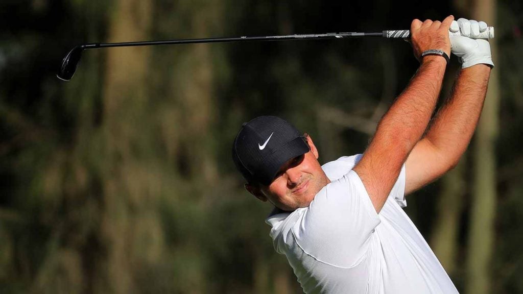 Patrick Reed hits a shot during Thursday's first round of the Mexico Championship.