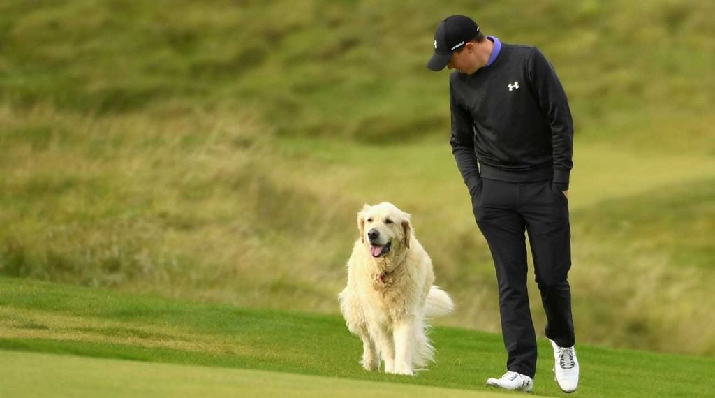 Matthew Fitzpatrick walks alongside his dog at Kingsbarns Golf Links in 2017.