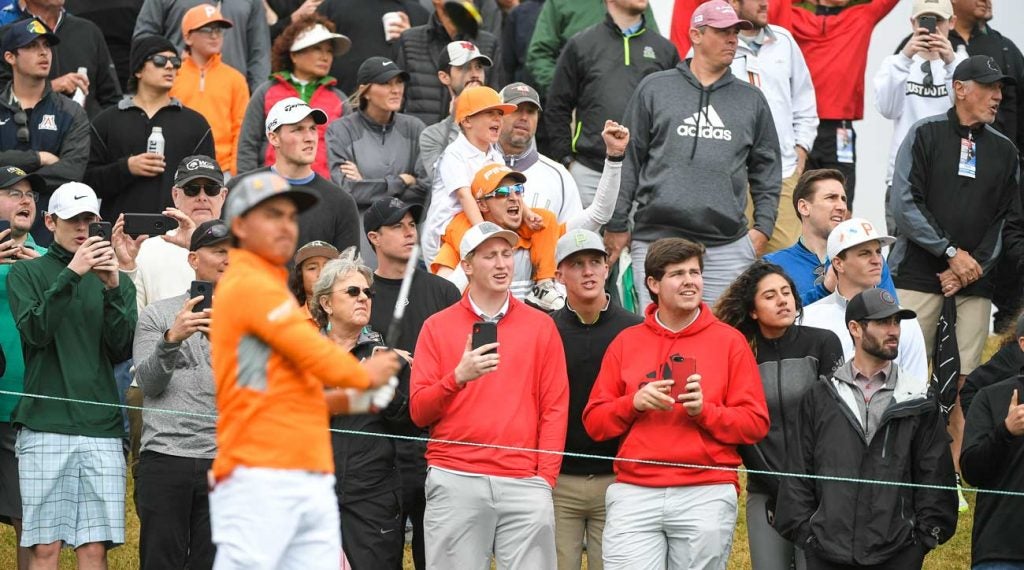 You can typically spot a couple orange-clad onlookers in the background of every Rickie Fowler photo.