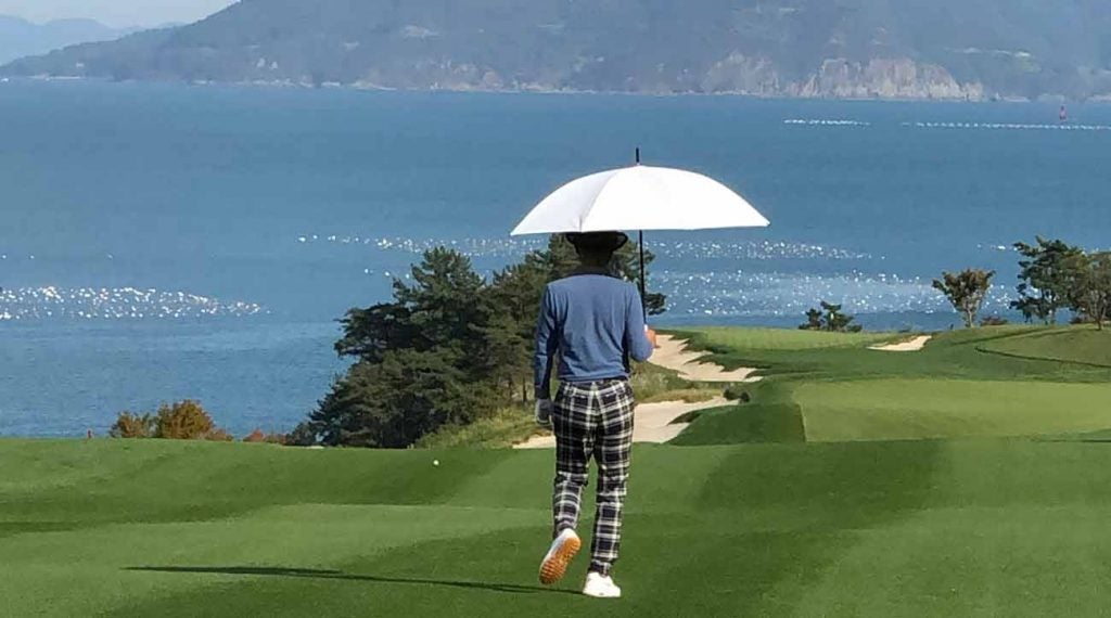 South Cape Owners Club owner and visionary, JB Chung, strides down the 12th fairway.