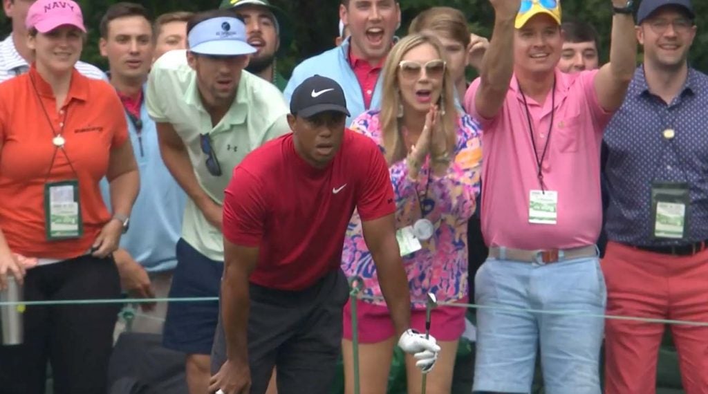 Tiger Woods and Michael Phelps stared down Woods' tee shot at No. 16 on Masters Sunday.