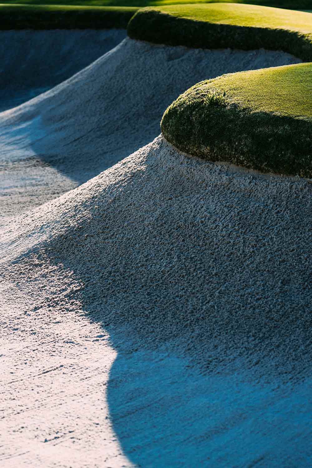 Riv's signature sharp edged bunkers.