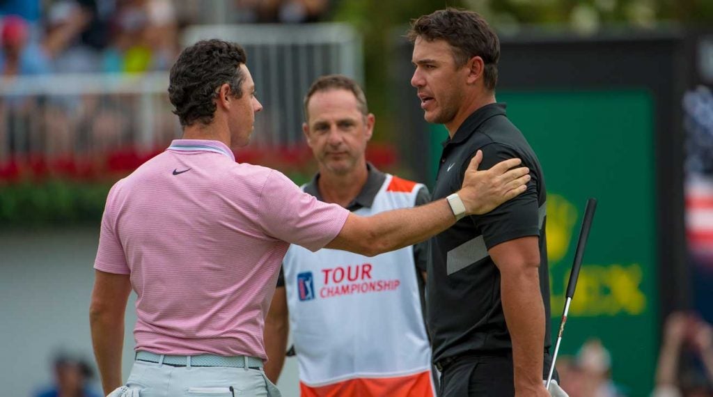 Rory McIlroy and Brooks Koepka after McIlroy won the 2019 Tour Championship