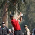 Tiger Woods hits a shot during Sunday's final round of the Genesis Invitational.