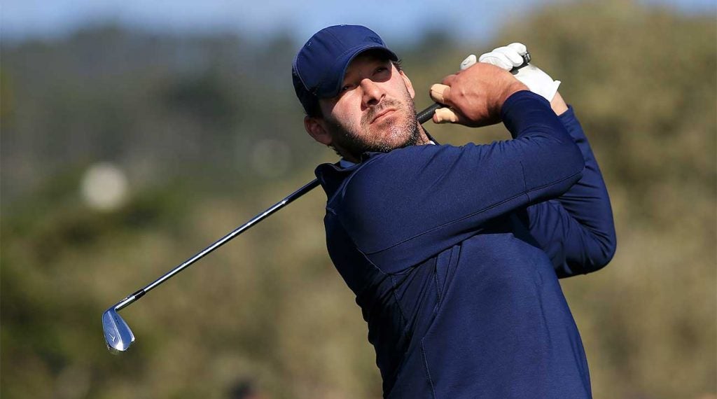 Tony Romo watches a shot during the 2020 AT&T Pebble Beach Pro-Am.
