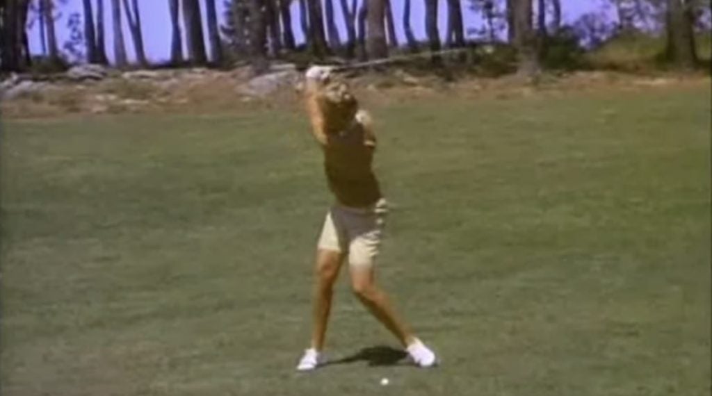 Mickey Wright at the top of her backswing.