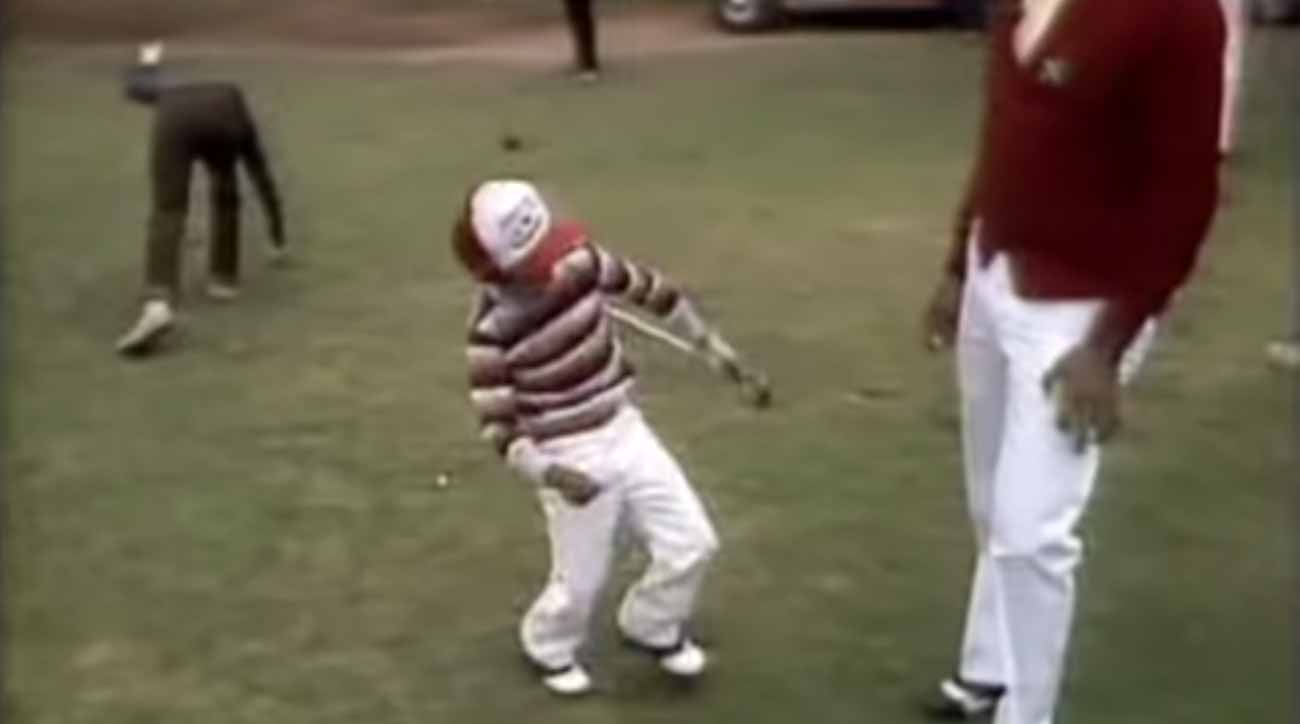Tiger celebrating a crisp chip shot.