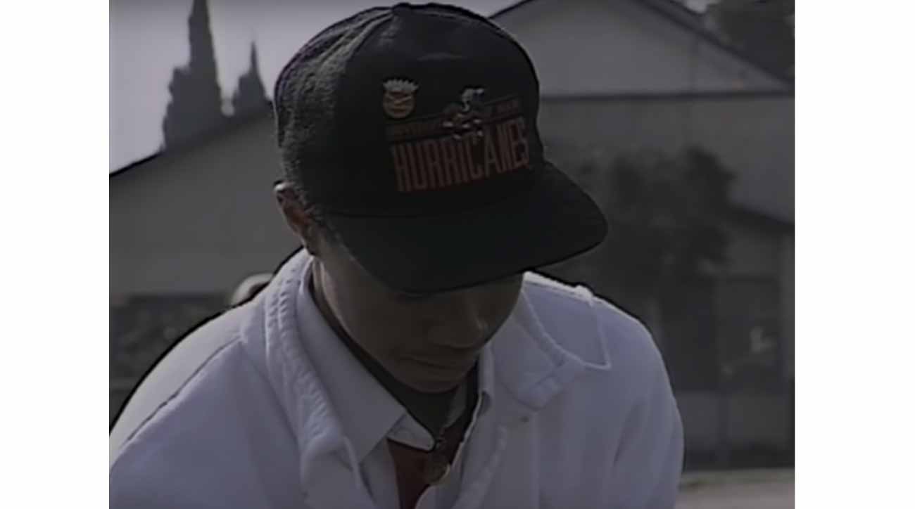 Tiger had some serious hat game in the early '90s — plus this gold chain!