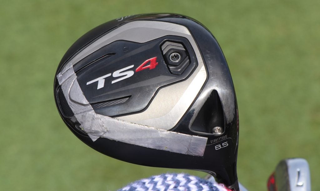 Scott Piercy applies lead tape to the rear and heel sections of his Titleist TS4 driver to dial in his ball flight. 