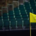 Empty grandstands and a flagstick at Augusta National