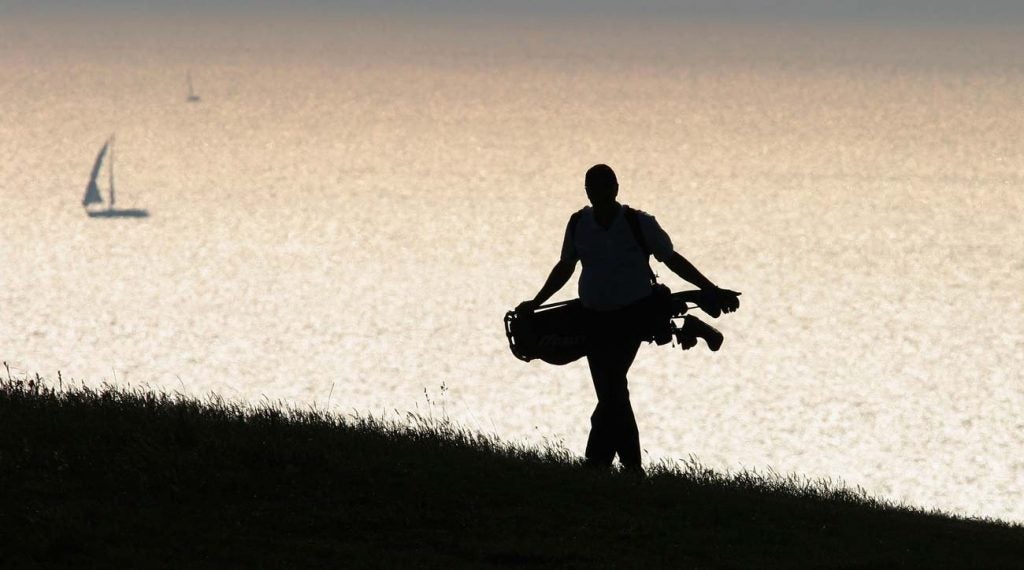 golfer walking alone
