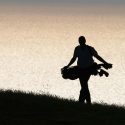 golfer walking alone