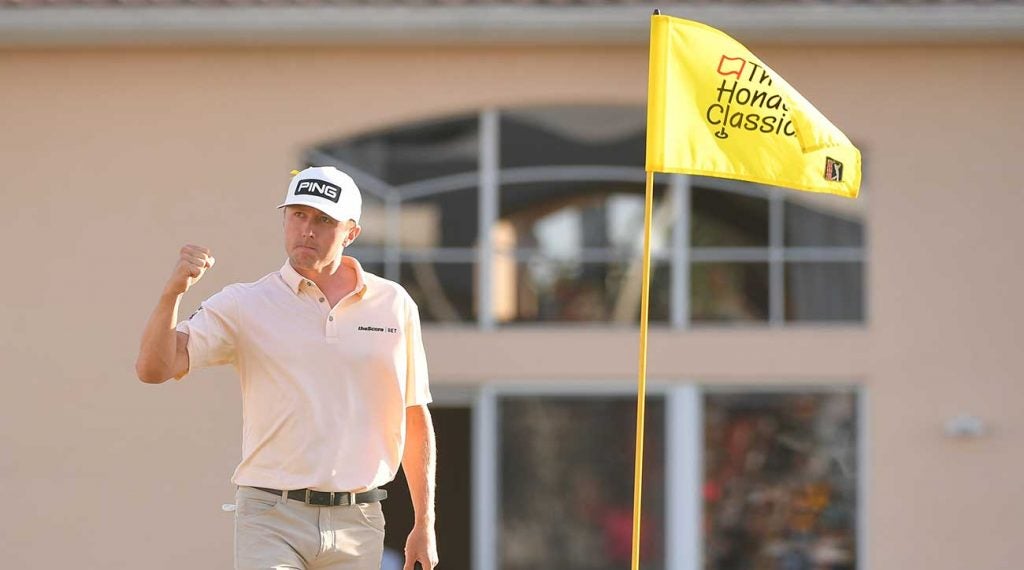 Mackenzie Hughes pumps his fist after making a putt during the final round of the Honda Classic.